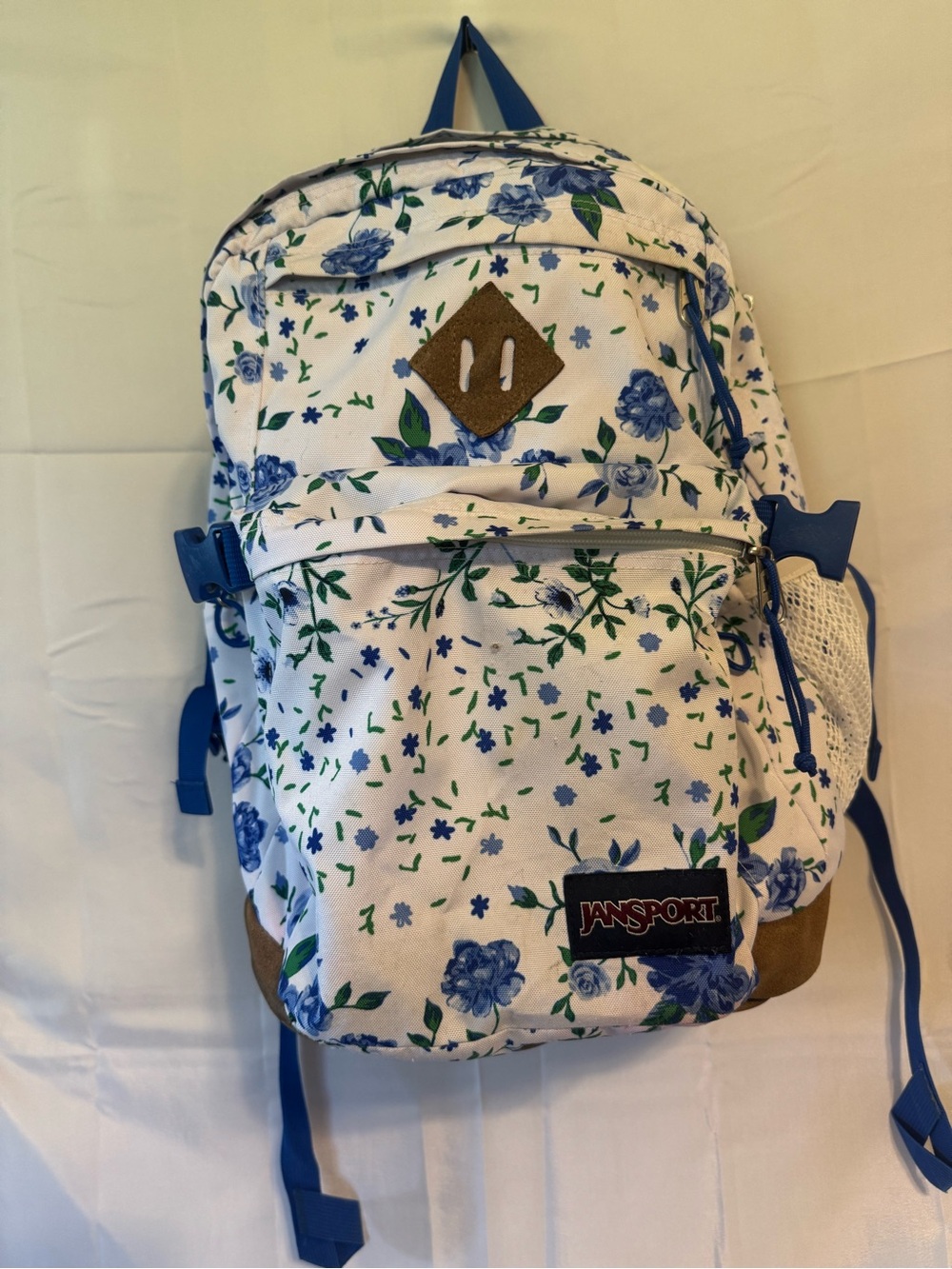 JanSport White Backpack with Blue Floral Print